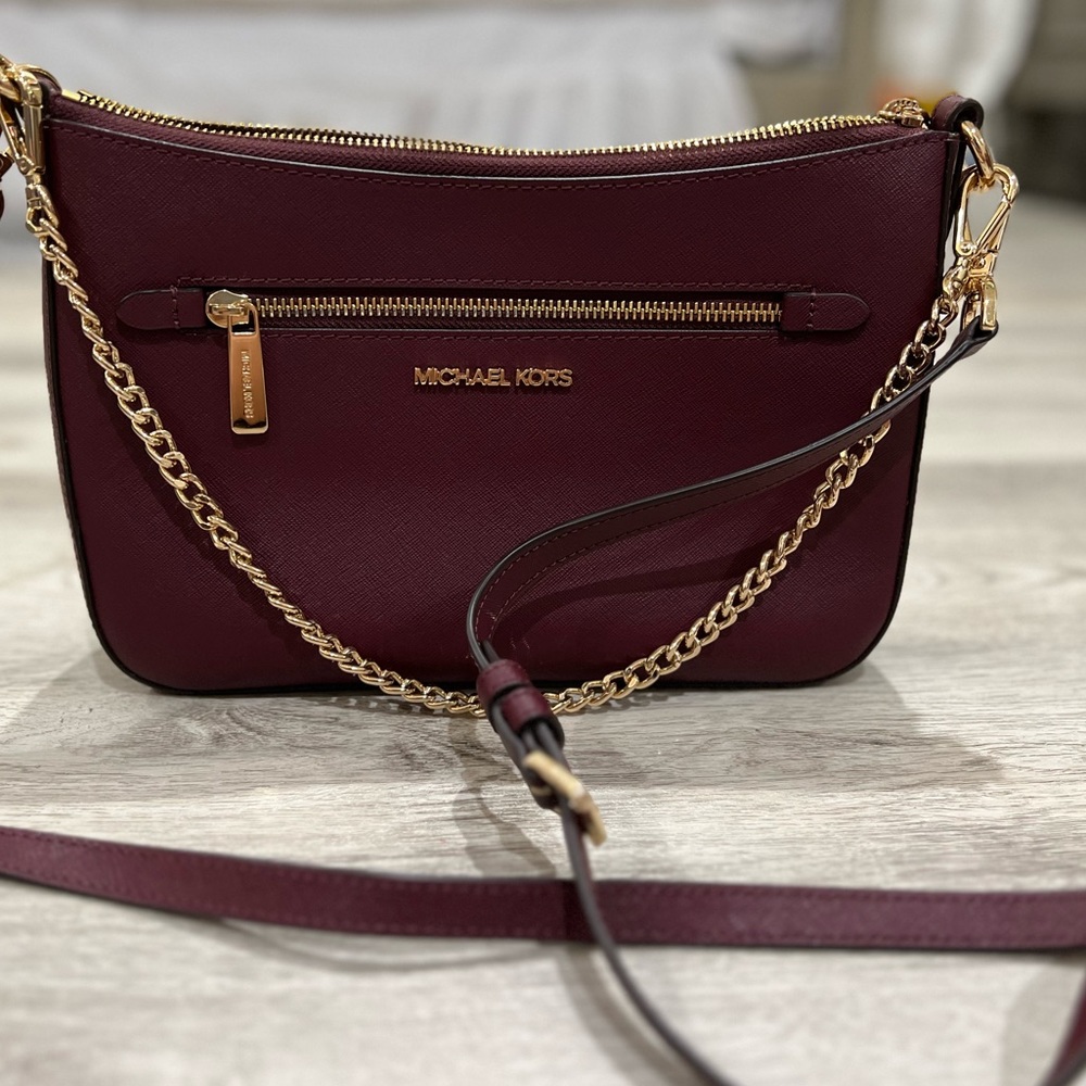 Maroon Michael Kors crossbody with gold chain